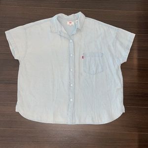 Short sleeve collared button down, light blue shirt